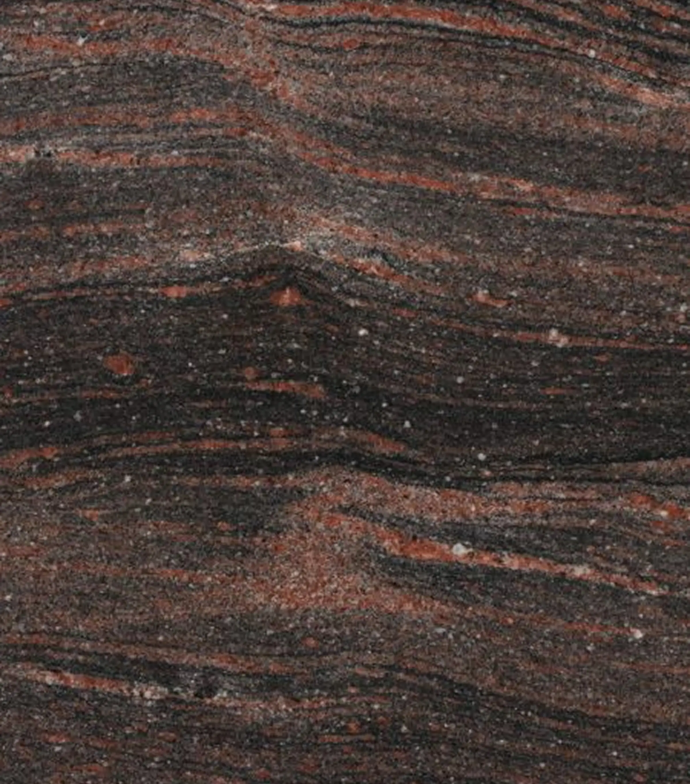 Campione di Granito Himalaya con venatura scura su fondo rossastro utilizzato per i lavandini di design dello showroom Brera in Via Fiori Chiari a Milano - lavorazione artigianale Trapattoni Marmi